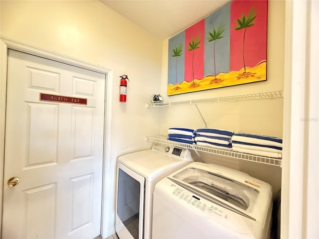 8557 La Isla Dr, Kissimmee, FL 34747 - washroom featuring washer and dryer