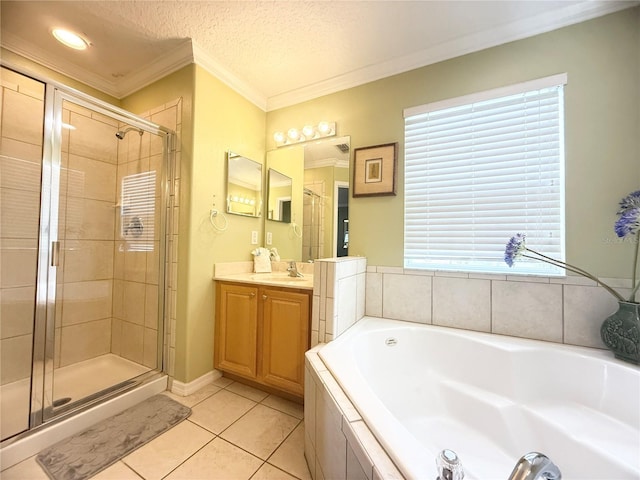 8557 La Isla Dr, Kissimmee, FL 34747 - bathroom with a shower stall, a bath, vanity, tile patterned flooring, and crown molding