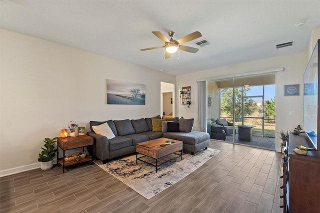 living room featuring ceiling fan