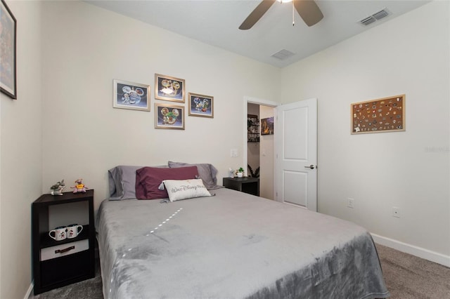 bedroom with ceiling fan and carpet flooring