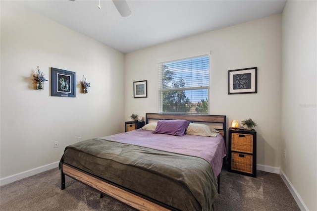 bedroom with ceiling fan and carpet flooring