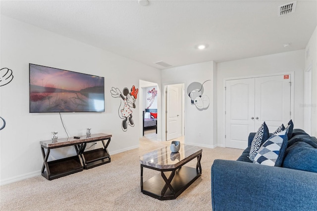 living room with light colored carpet