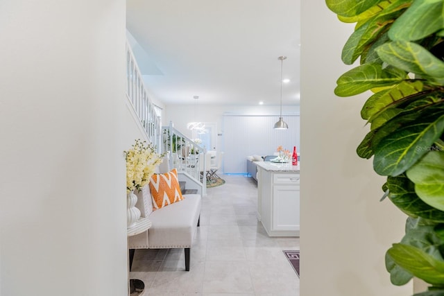 hallway featuring light tile patterned flooring