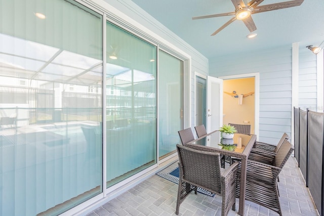 balcony featuring ceiling fan