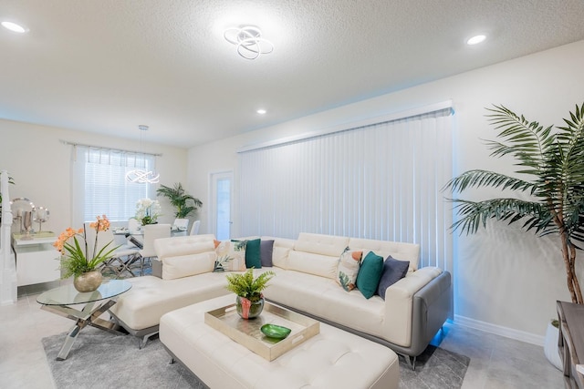 living room with a textured ceiling