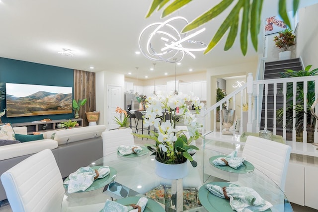 dining space featuring an inviting chandelier