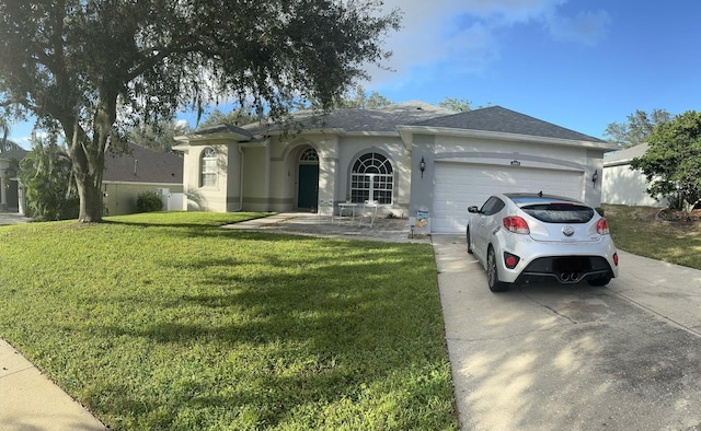 ranch-style home featuring a garage and a front lawn