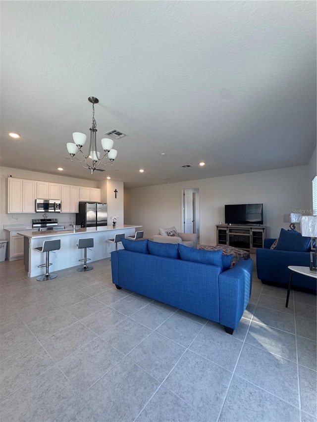 living room featuring an inviting chandelier