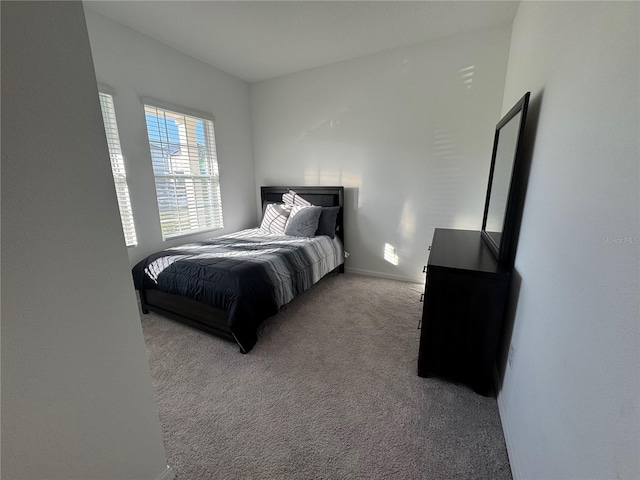 bedroom with light carpet