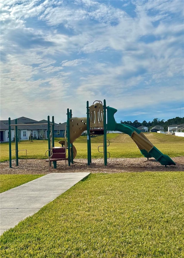 view of jungle gym with a yard