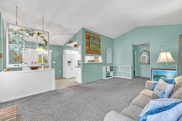 living room featuring light colored carpet, lofted ceiling, and a textured ceiling