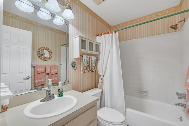 full bathroom featuring vanity, toilet, and shower / bathtub combination with curtain