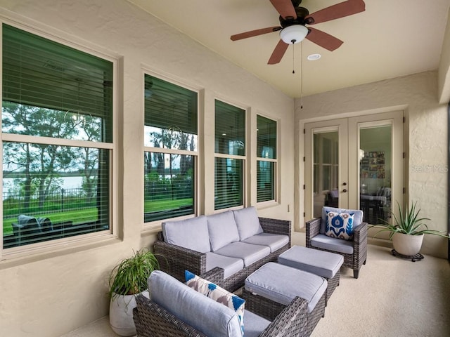 sunroom with french doors and ceiling fan