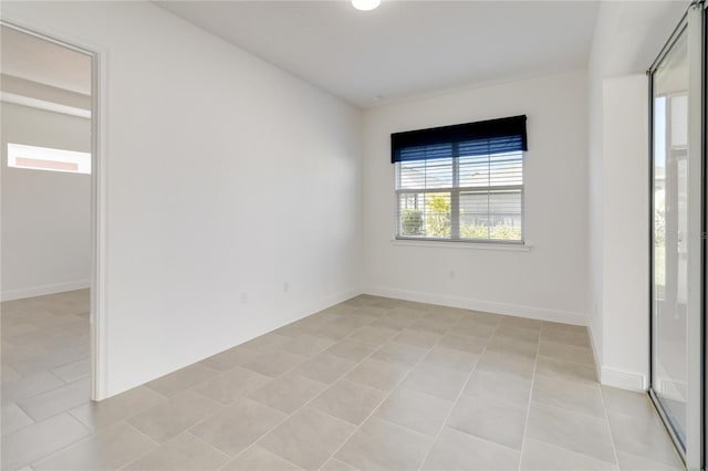 view of tiled spare room