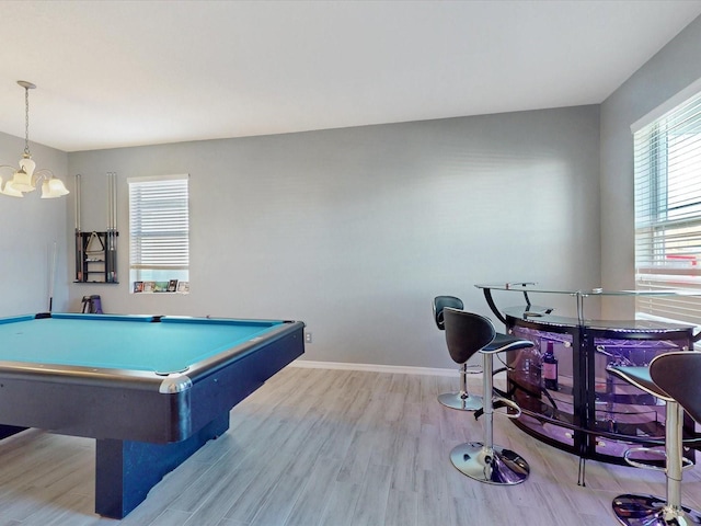 rec room with pool table and light hardwood / wood-style floors