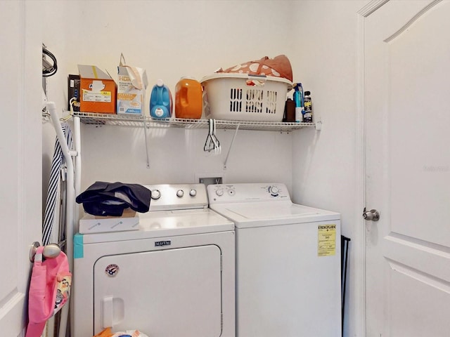 laundry area featuring independent washer and dryer