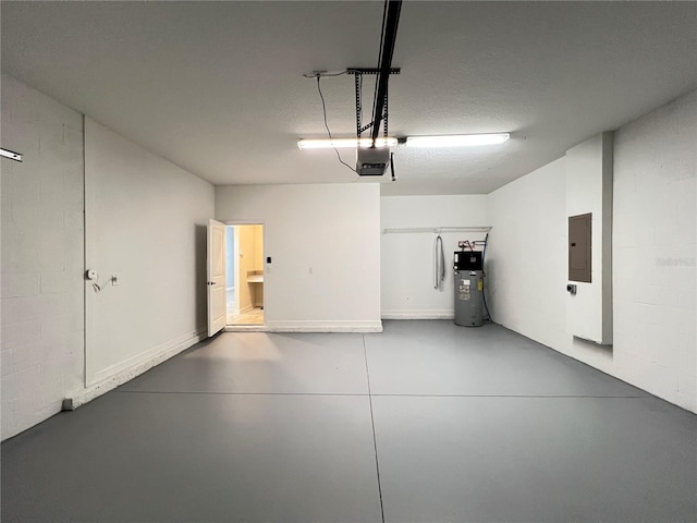 garage with electric panel, electric water heater, and a garage door opener