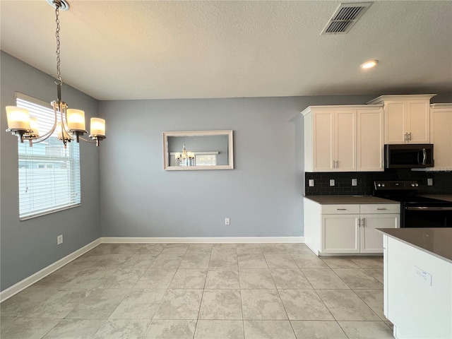 kitchen featuring tasteful backsplash, decorative light fixtures, a notable chandelier, white cabinets, and black / electric stove