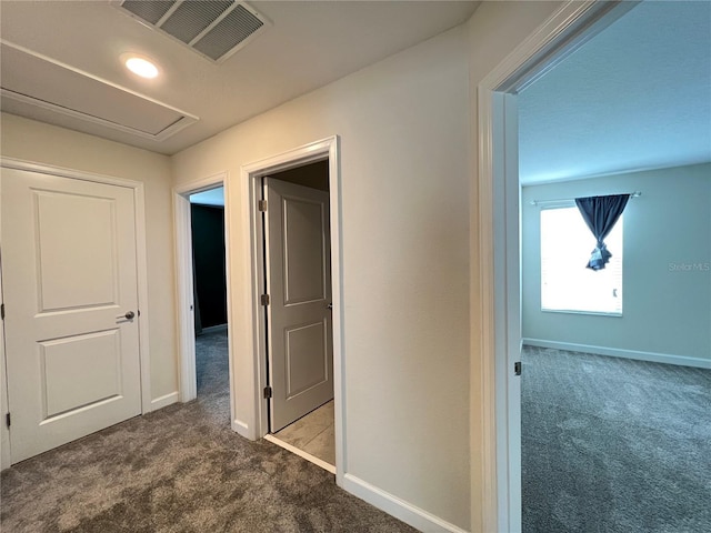 corridor with carpet floors