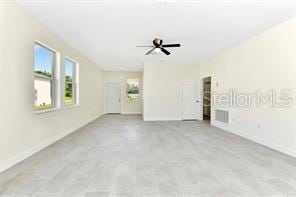 empty room with ceiling fan