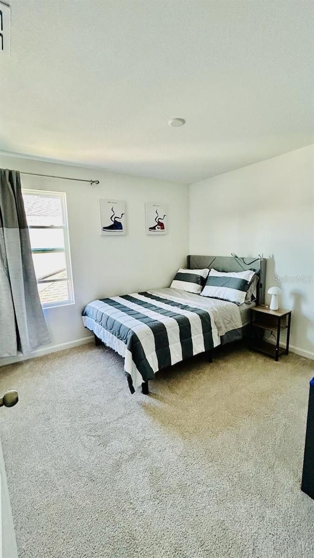 bedroom featuring carpet floors