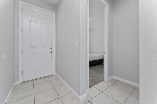 interior space featuring light tile patterned floors