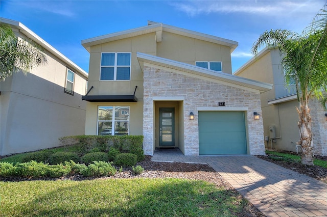 view of front of home with a garage