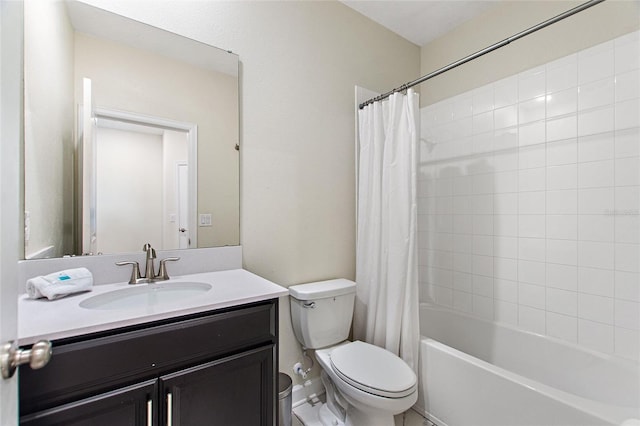 full bathroom featuring vanity, toilet, and shower / tub combo with curtain