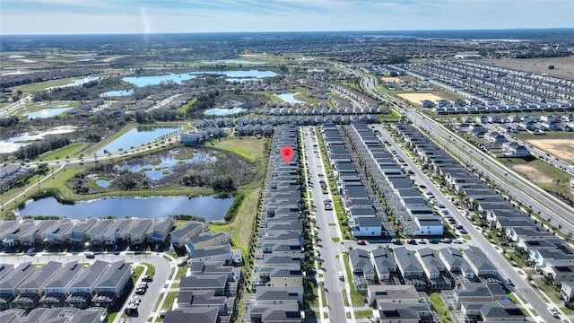 drone / aerial view featuring a water view