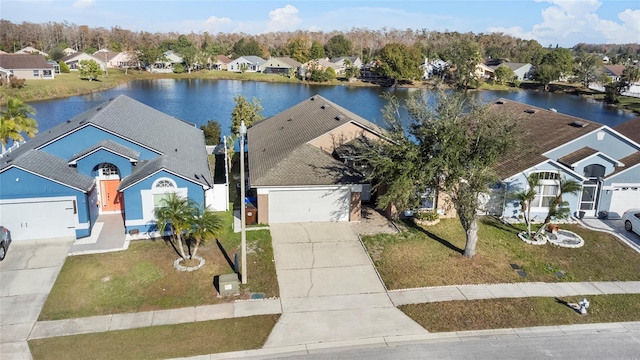 bird's eye view with a water view