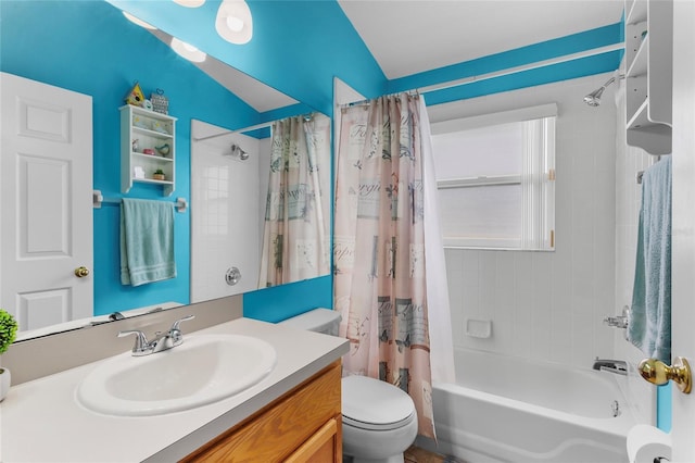 full bathroom with shower / bath combo, toilet, vanity, and vaulted ceiling