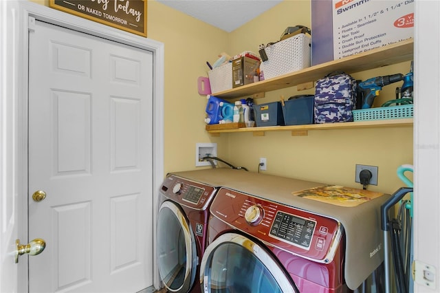 laundry room featuring washer and dryer