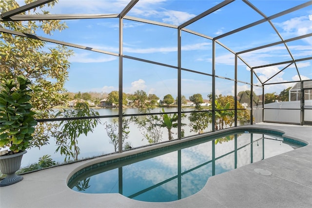 view of pool featuring a water view and a lanai