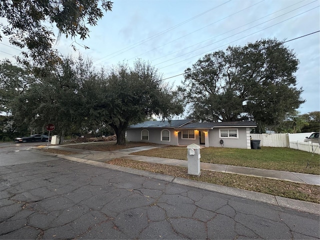 view of front of property with a front lawn