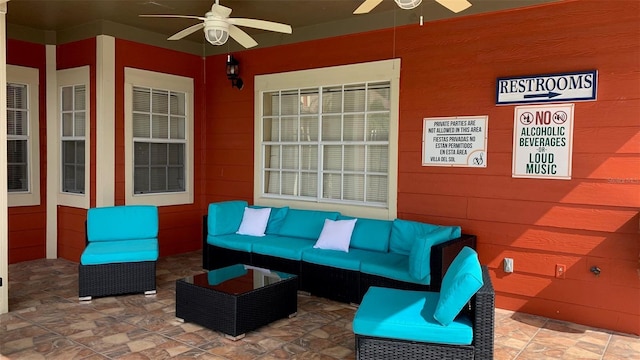 view of patio / terrace with an outdoor living space and ceiling fan