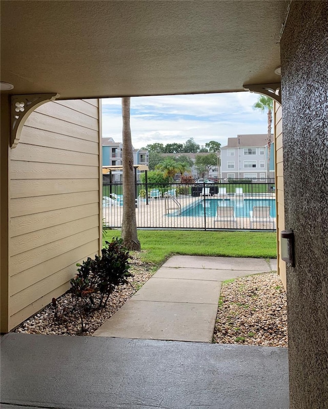 view of patio / terrace with a community pool