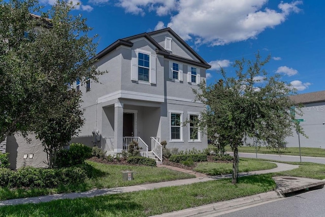 view of front of property with a front yard