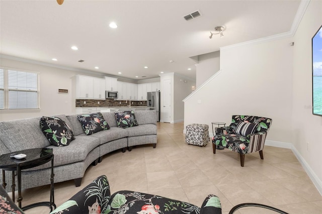 tiled living room featuring ornamental molding