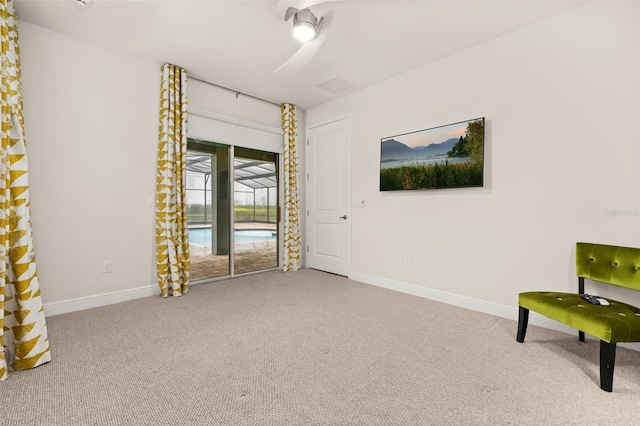 unfurnished room with light colored carpet