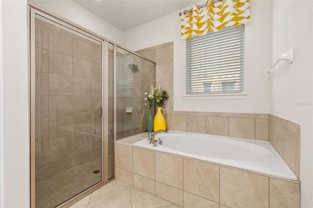 bathroom featuring tile patterned flooring and plus walk in shower