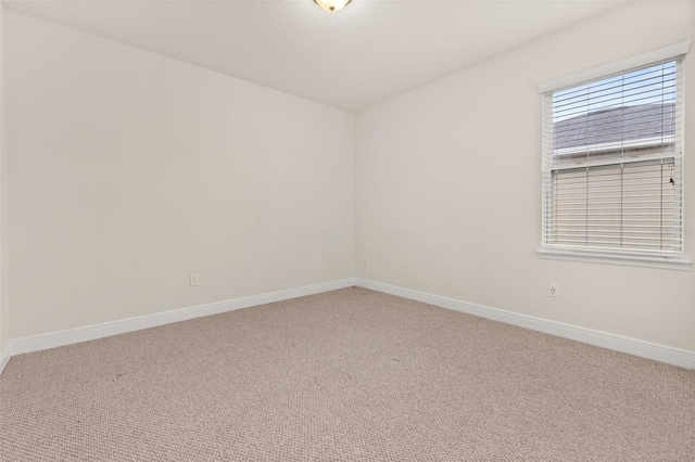 spare room with carpet flooring