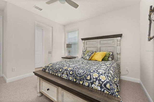 bedroom with light colored carpet and ceiling fan