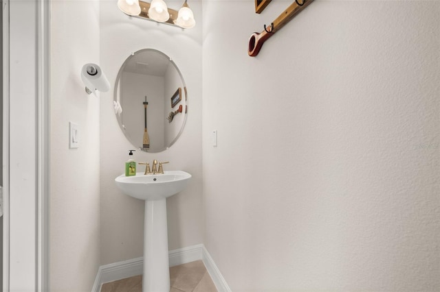 bathroom featuring tile patterned floors and sink