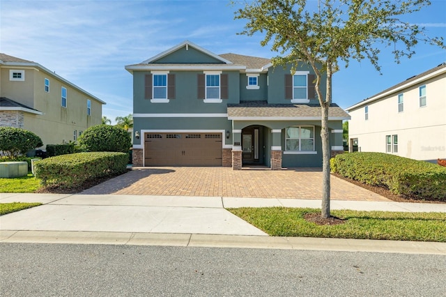 view of front of home with a garage