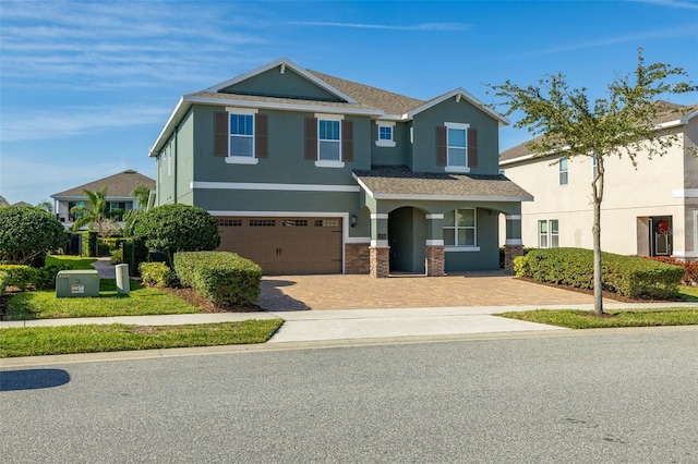 view of front of property featuring a garage