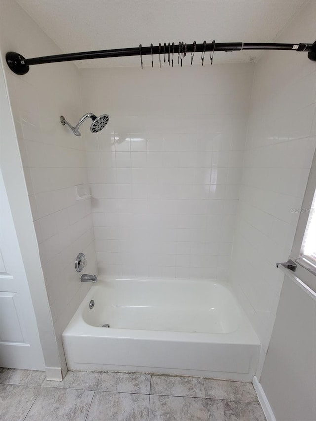 bathroom featuring bathtub / shower combination and tile patterned floors