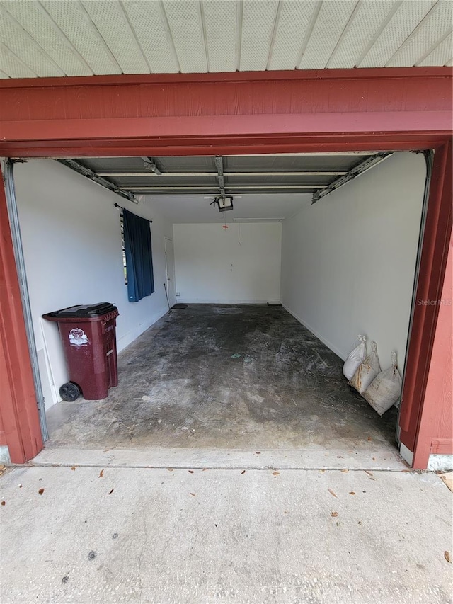 garage featuring a garage door opener