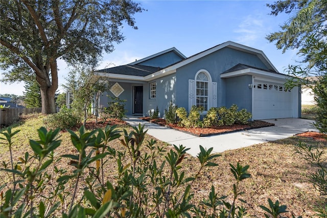 ranch-style house featuring a garage