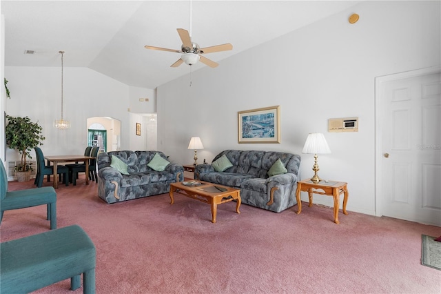 carpeted living room featuring ceiling fan and high vaulted ceiling