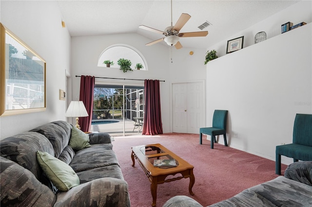 living room with carpet flooring, ceiling fan, and high vaulted ceiling